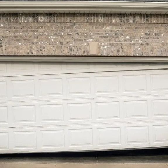 Can I replace garage door rollers myself?