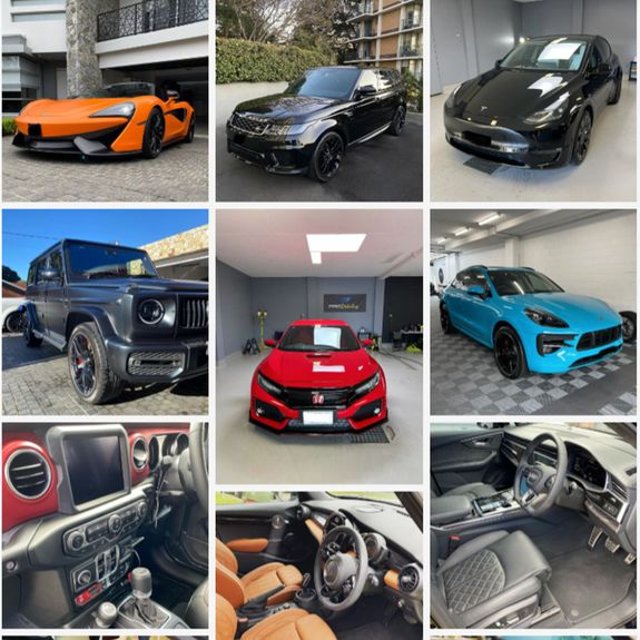 Detailed view of a white car's tail light in a moody outdoor setting.