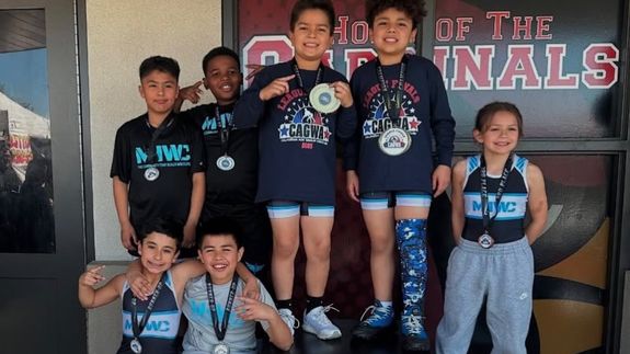 Bird's Eye View of Two People Canoeing on Body of Water
