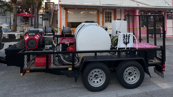 Man Cleaning Stairs on Street