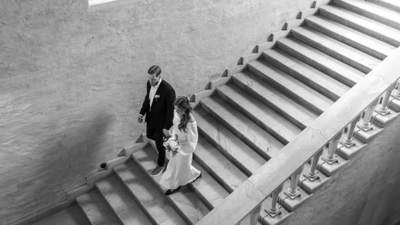 Black Dslr Camera on Beige Wooden Surface