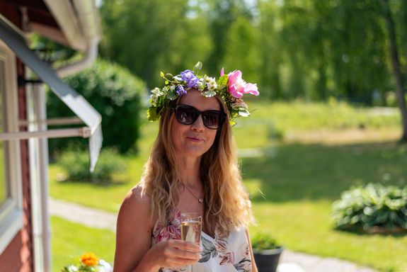 Photographers standing on shore and taking photos of stormy sea