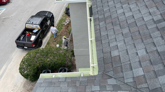 Concentrated man washing automobile at car wash