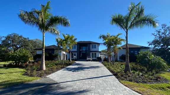Man Cleaning Stairs on Street