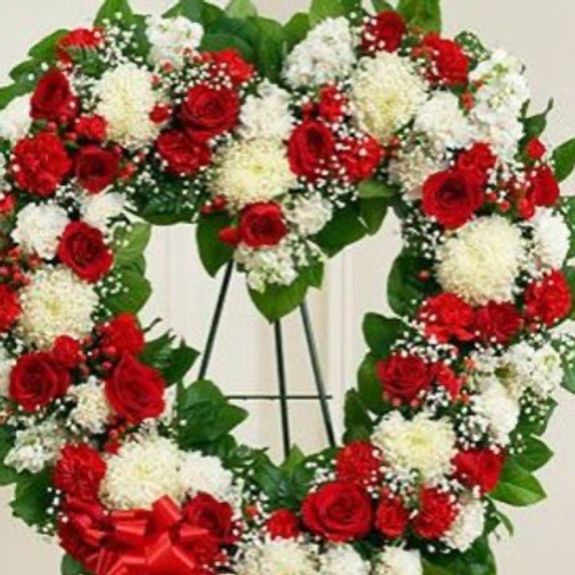 How can I personalize a funeral spray for my loved one?
