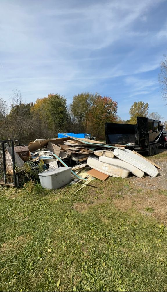 Person Holding Clear Plastic Bottle