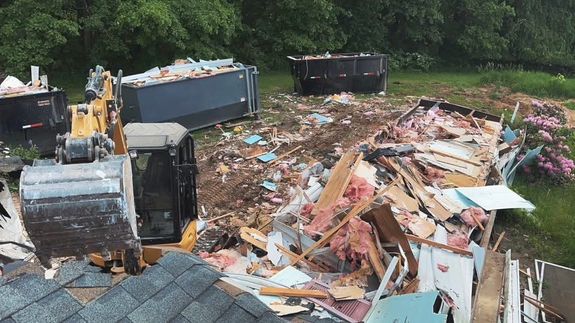 Old fashioned cassette player placed in shabby garage near old industrial equipment