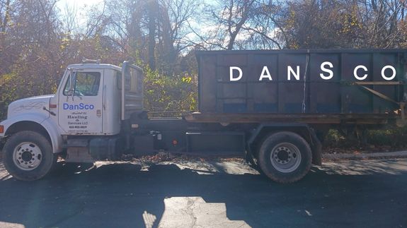 Yellow Dump Truck on Road