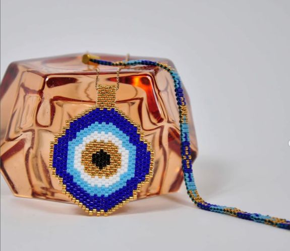 open sign hanging on physical storefront