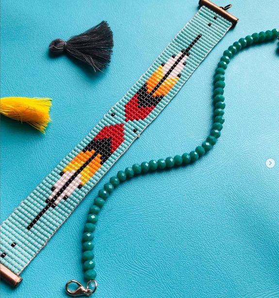 silver iMac near iPhone on brown wooden table