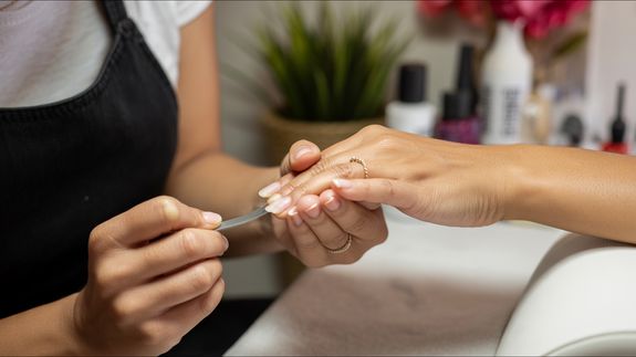 Woman With Pink Manicure