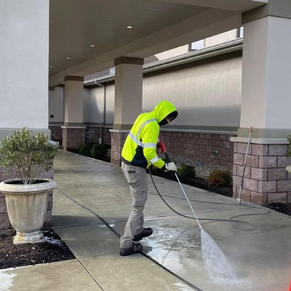 What is the difference between power washing and soft washing?