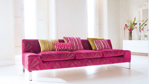 Person in Blue Gloves Cleaning White Sink