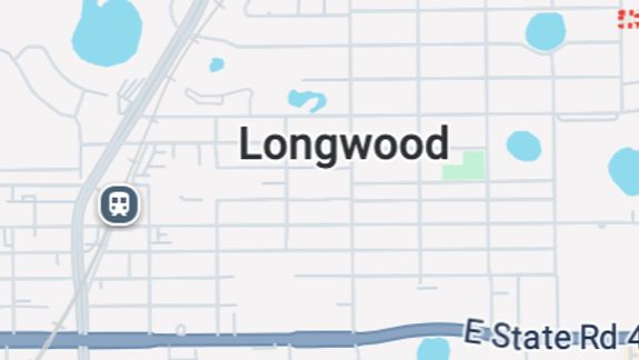 A car interior with a steering wheel and dashboard