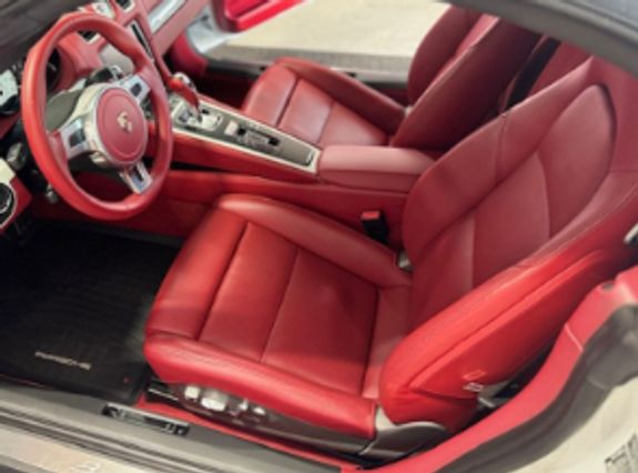 A Person Buffing a Car