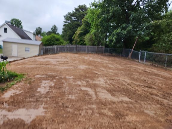 What preparation is needed before installing sod or seeding?