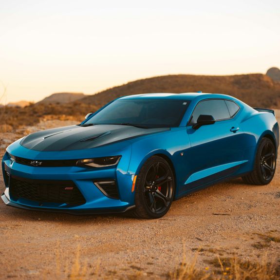 Red Subaru Sedan on Road