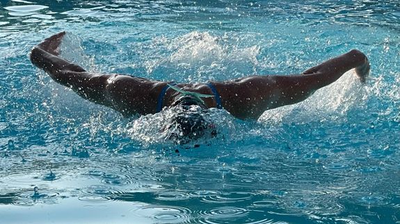 Shallow Focus Photo of Person Swimming