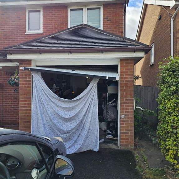 What types of emergency repairs do you offer for garage doors?