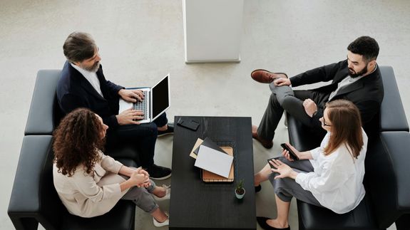 Man and Woman Near Table